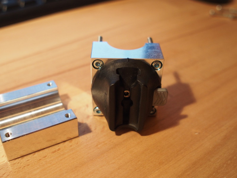 The new bracket with bolts and lock socket